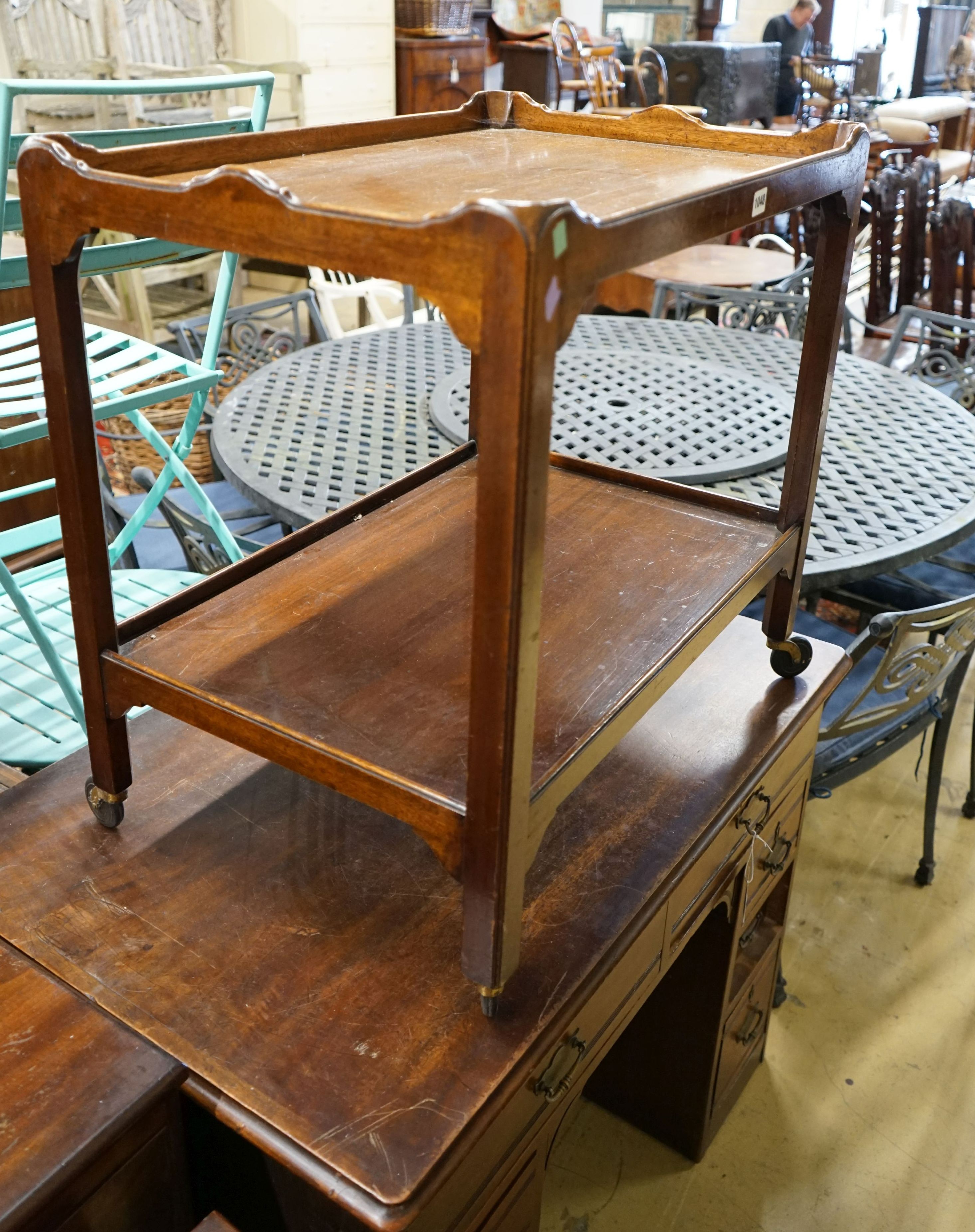 A late Victorian mahogany kneehole desk, length 107cm, height 80cm